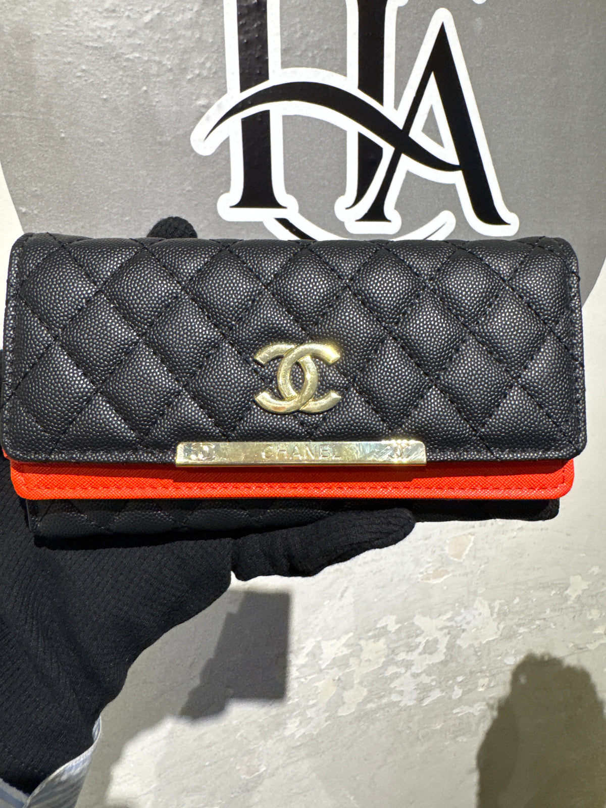 Luxury Black Quilted Caviar Leather Long Flap Wallet with Vibrant Orange Lining