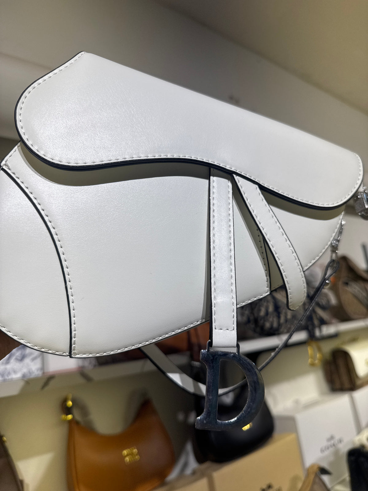 White Leather Saddle Shoulder Bag with Silver-Tone D Charm Accent