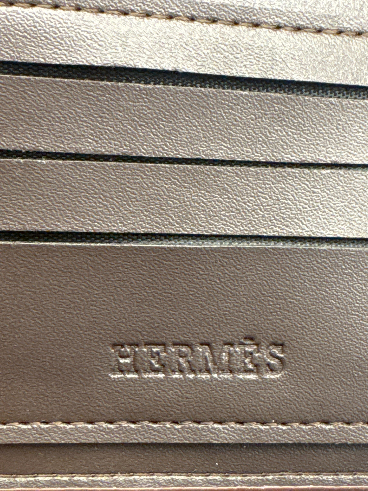 Black Pebble-Grain Leather Bifold Wallet with Metallic Silver H-Logo Accent