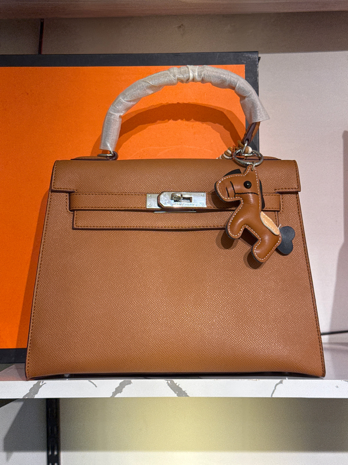 Tan Leather Top-Handle Structured Handbag with Horse Charm