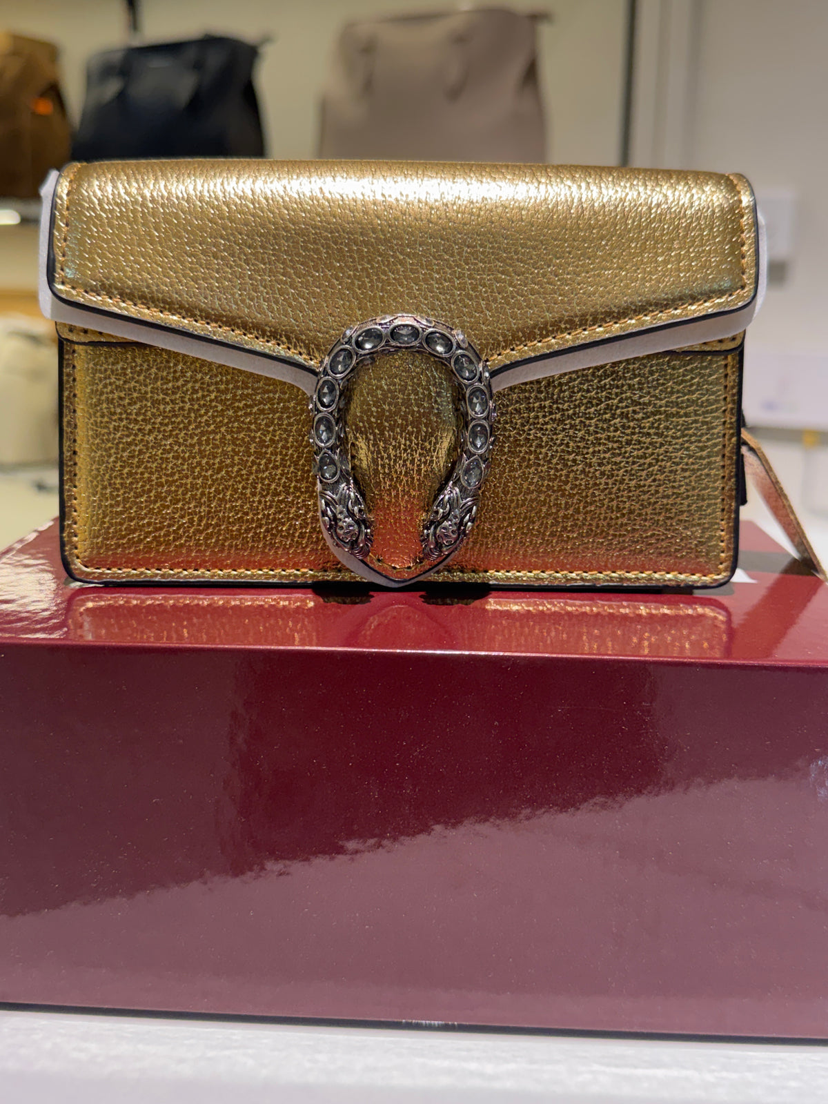 Metallic Gold Leather Mini Crossbody Bag with Antique Horseshoe Buckle