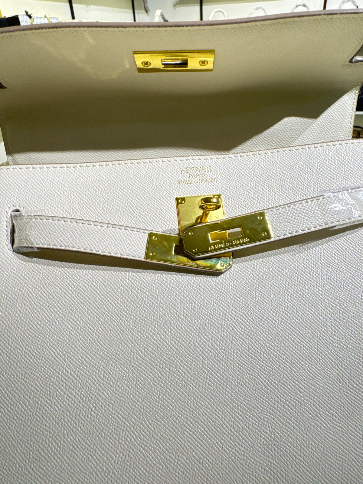 Off-White Leather Top-Handle Structured Handbag with Gold-Tone Lock Accent