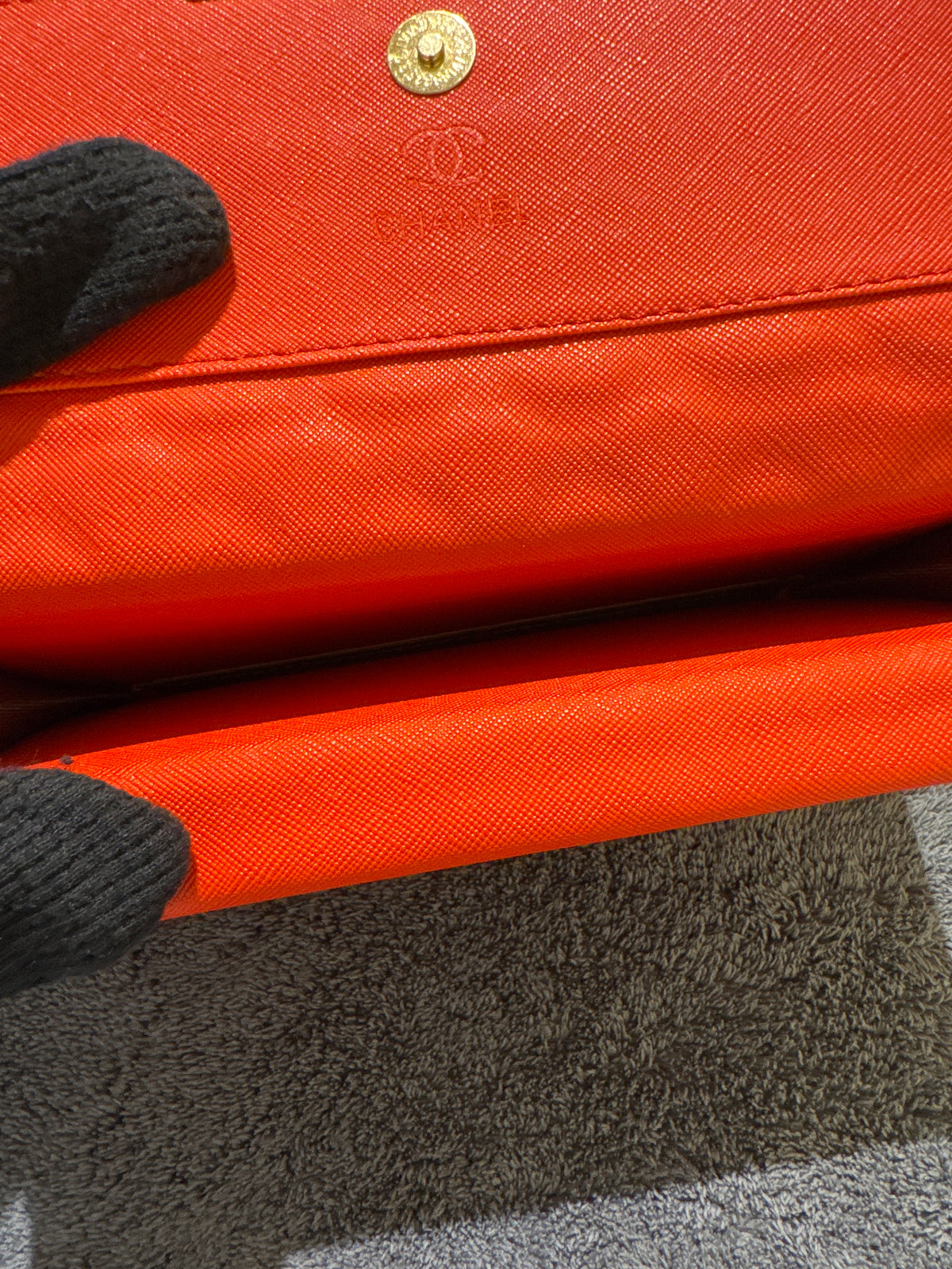 Luxury Black Quilted Caviar Leather Long Flap Wallet with Vibrant Orange Lining