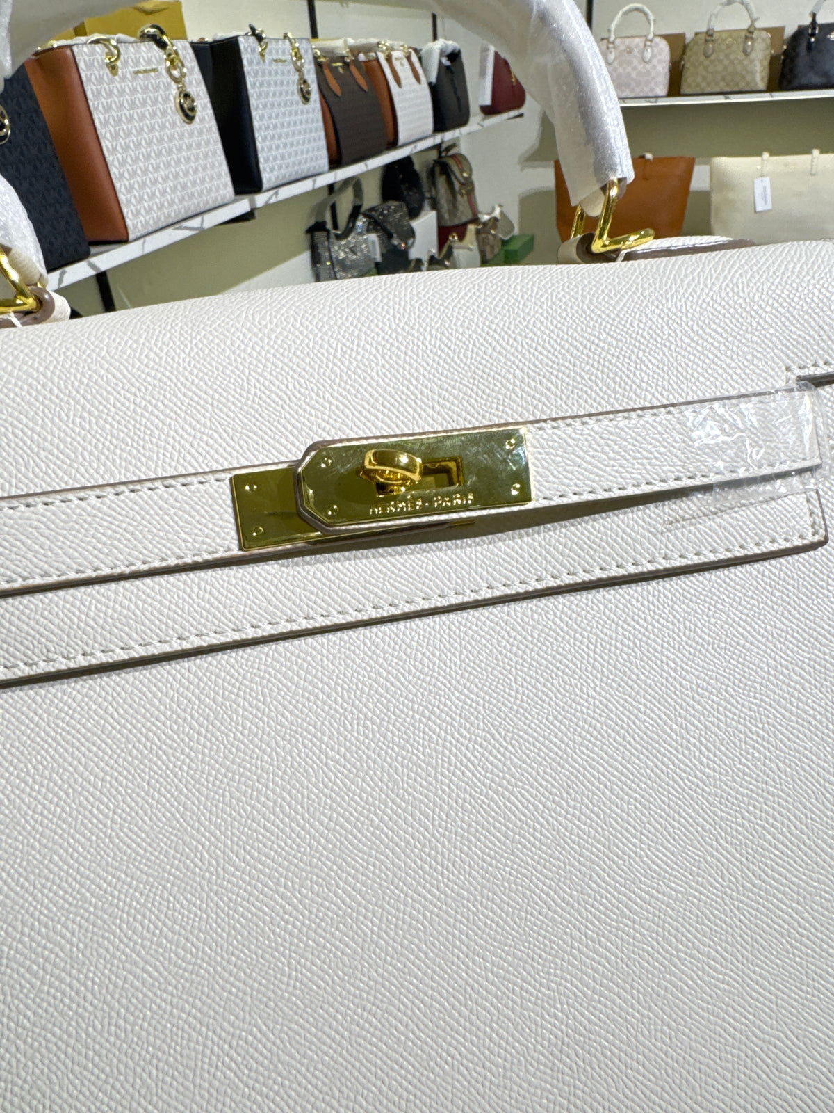 Off-White Leather Top-Handle Structured Handbag with Gold-Tone Lock Accent