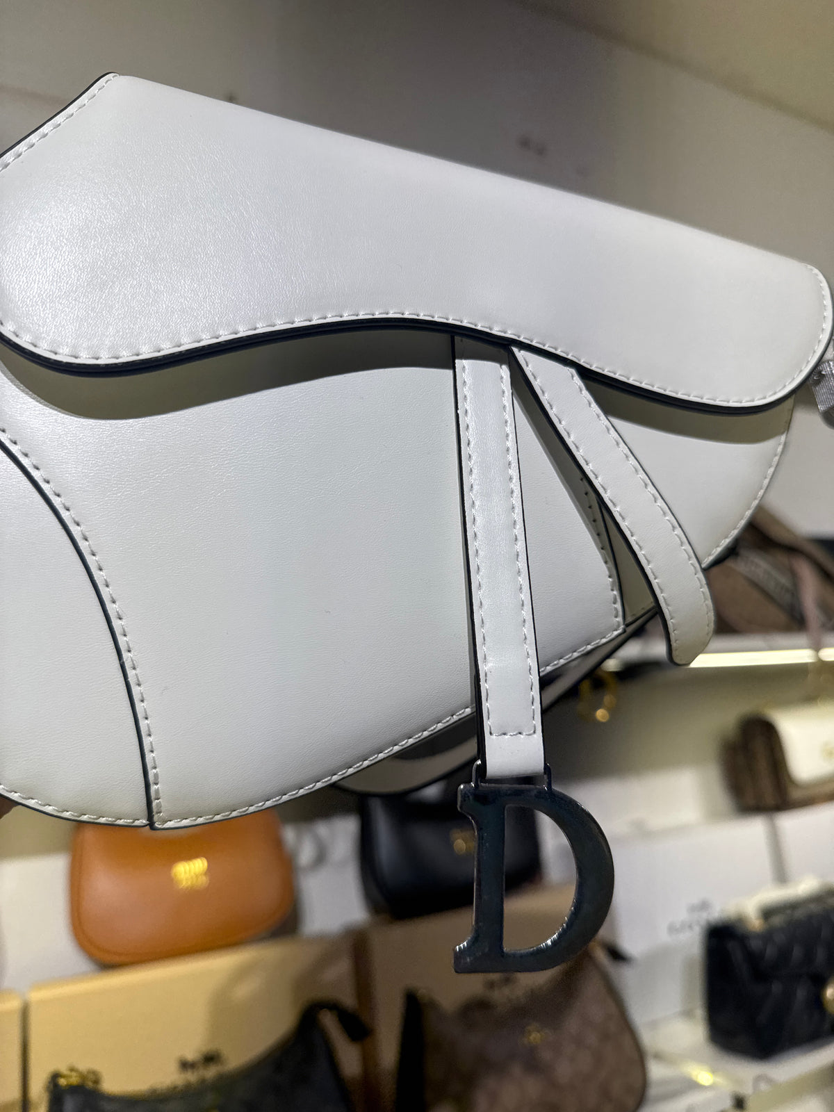 White Leather Saddle Shoulder Bag with Silver-Tone D Charm Accent